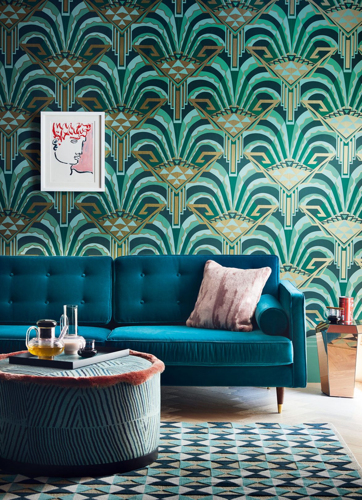 Fabulous Art Deco wall covering with teal velvet sofa