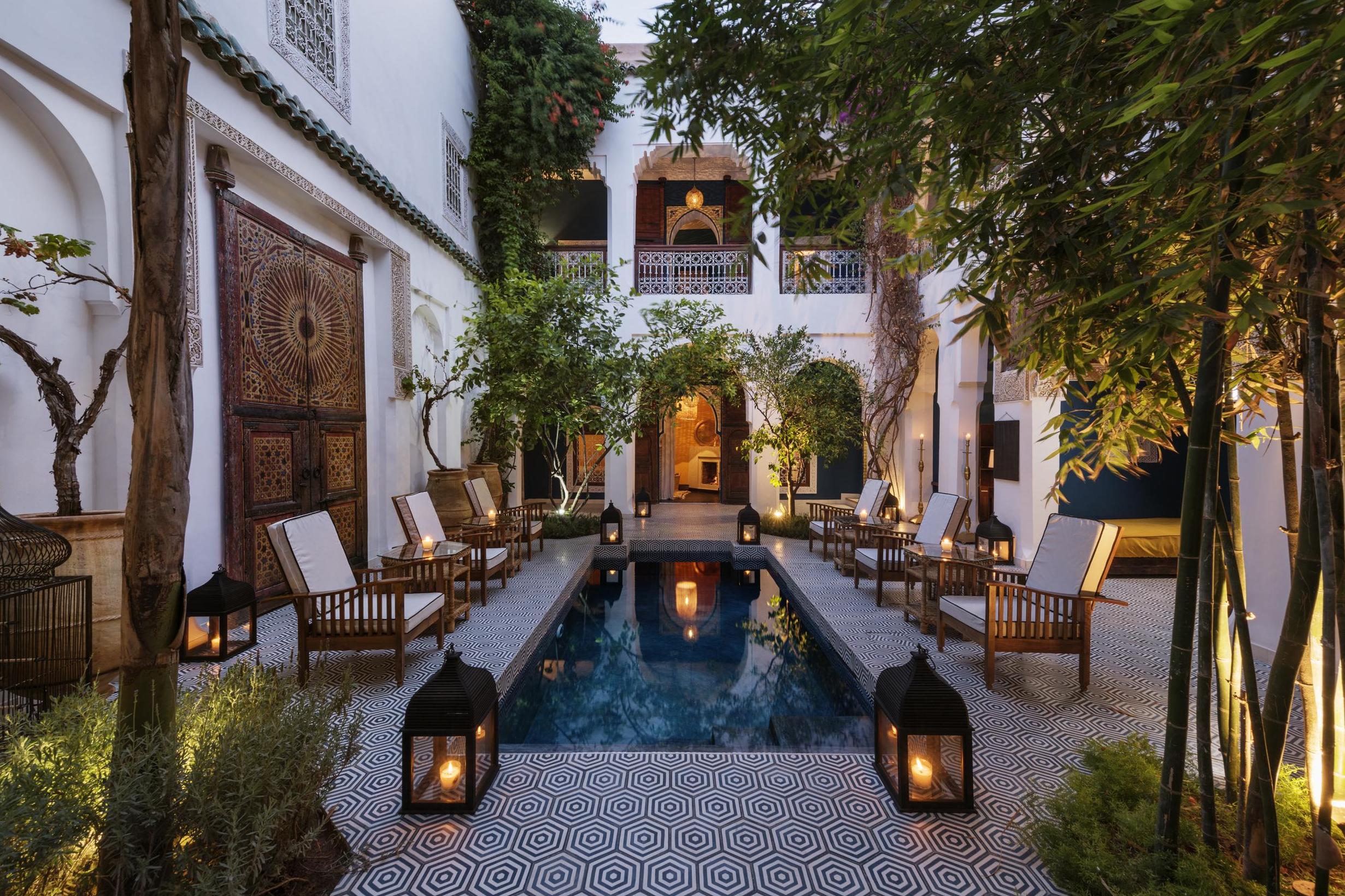 Moroccan courtyard with pool and lanterns